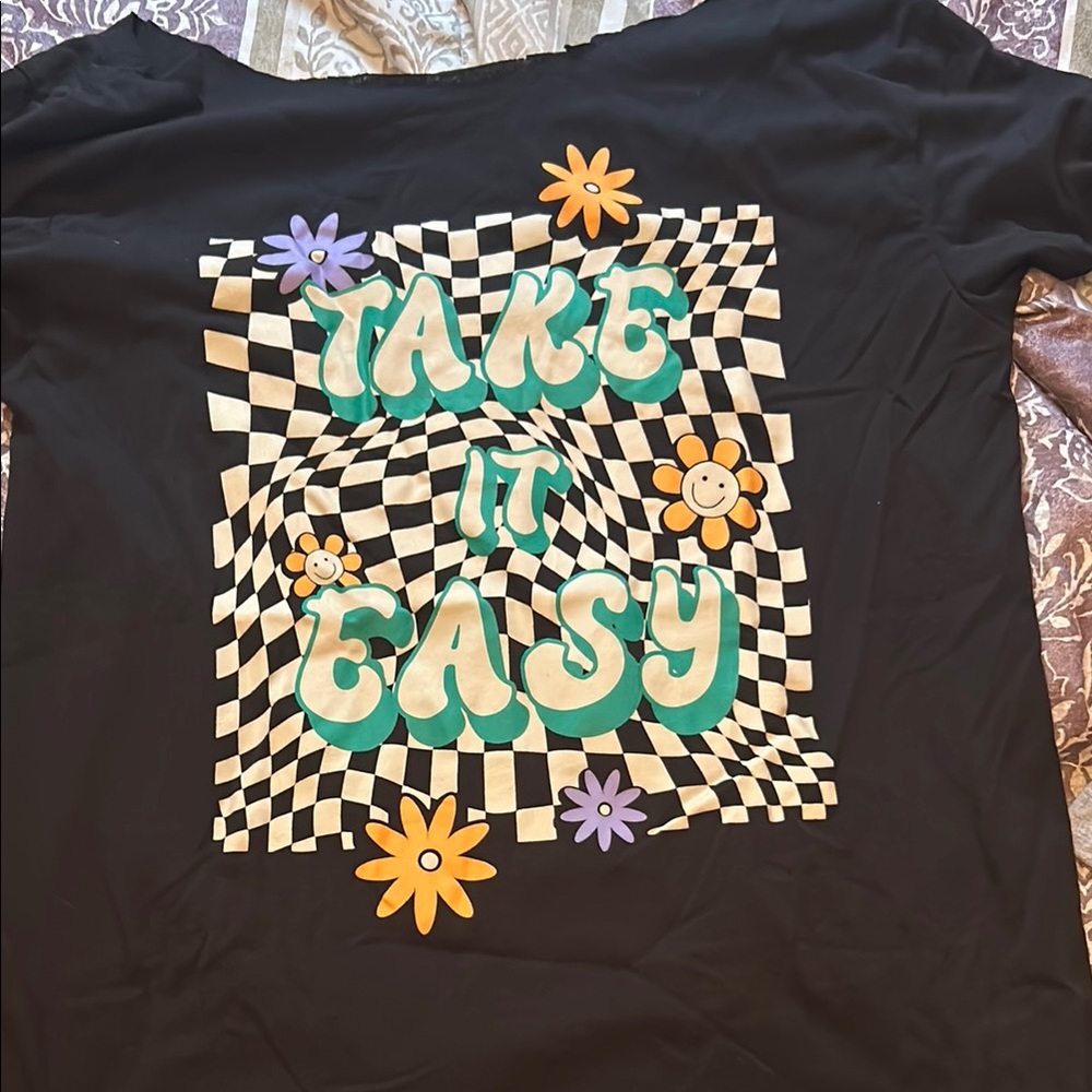 Black Graphic Tee with Checkered Pattern and Floral Design